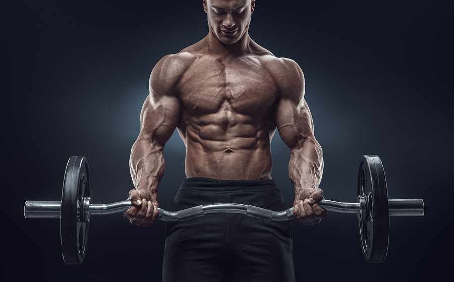Closeup Portrait Of A Muscular Man Workout With Barbell At Gym